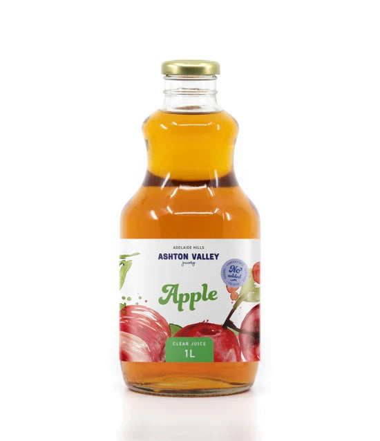 A 1L glass of Ashton Valley Juicery still clear apple juice