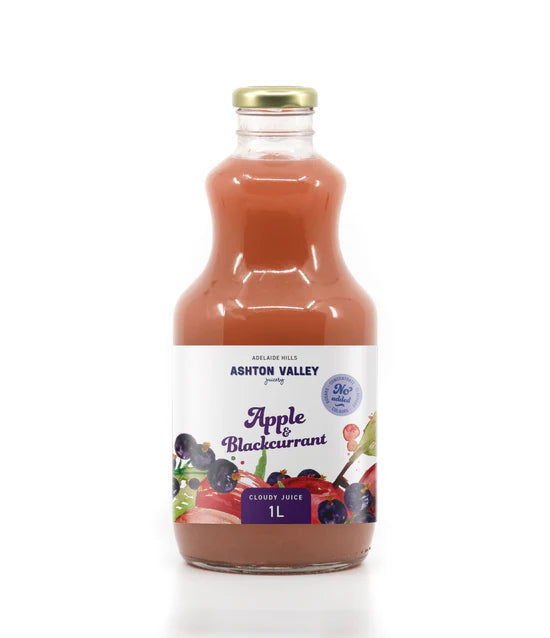 Bottle of Ashton Valley Apple & Blackcurrant juice on a white background