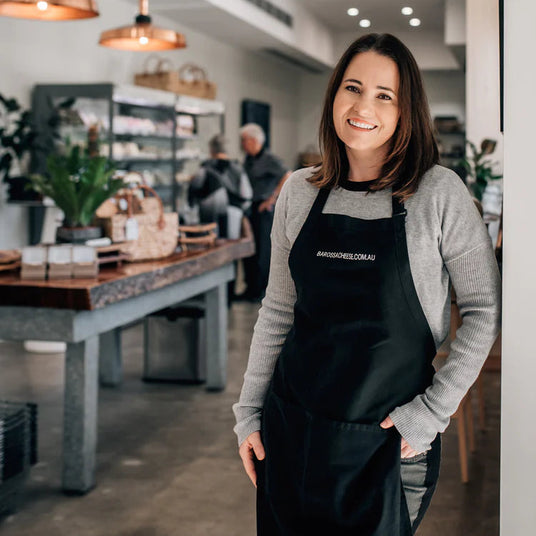 A person standing inside the Barossa Valley Cheese Co store