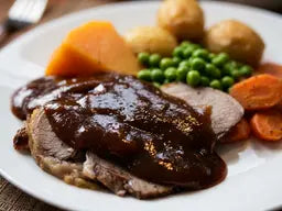 A 500g serve of Dinner King Roast Lamb with Veg