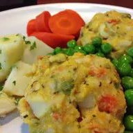 A 500g serve of Dinner King Vegetable Patties with Veg
