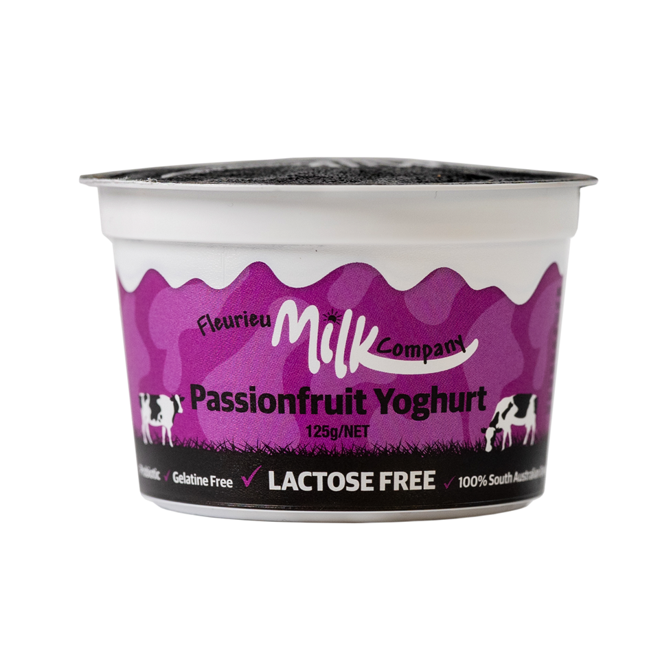 Passionfruit yoghurt container with purple label on a white background