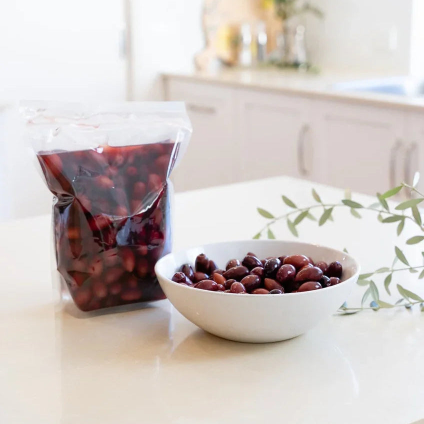 A 1kg bag of Kangaroo Island Olives Whole Smoked Kalamata Olives