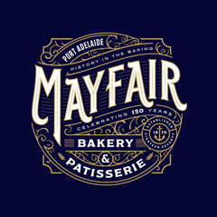 Mayfair Bakery & Patisserie logo on a dark blue background