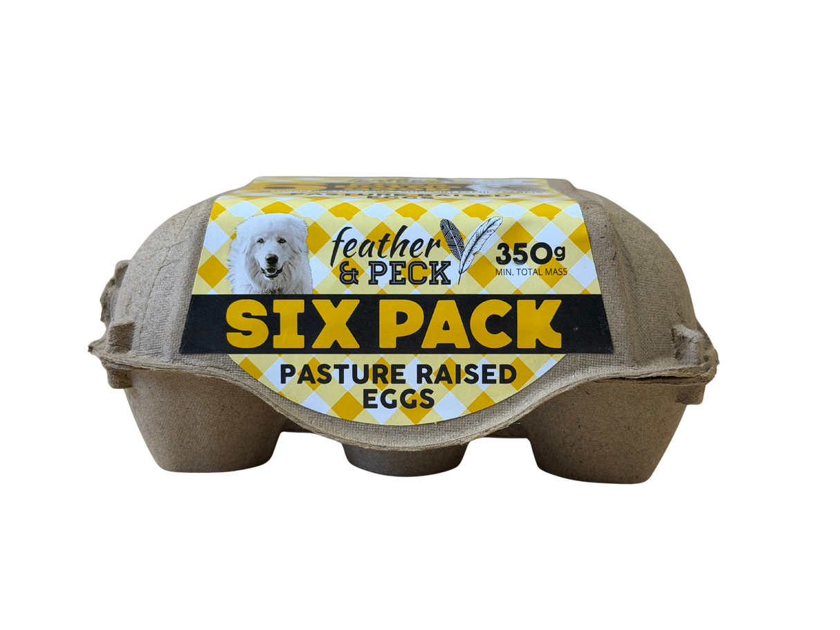 Six pack of pasture raised eggs with 'feather & peck' branding 