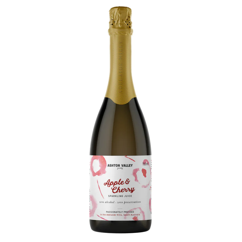 A glass bottle of Ashton Valley Juicery sparkling apple and cherry juice 750ml