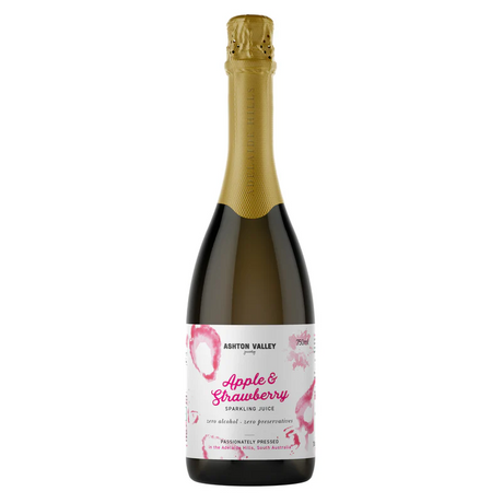 A glass valley of ashton valley juicery sparkling apple and strawberry juice 750ml