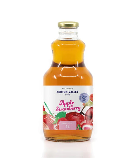 A 1L glass of Ashton Valley Juicery still clear apple and strawberry juice