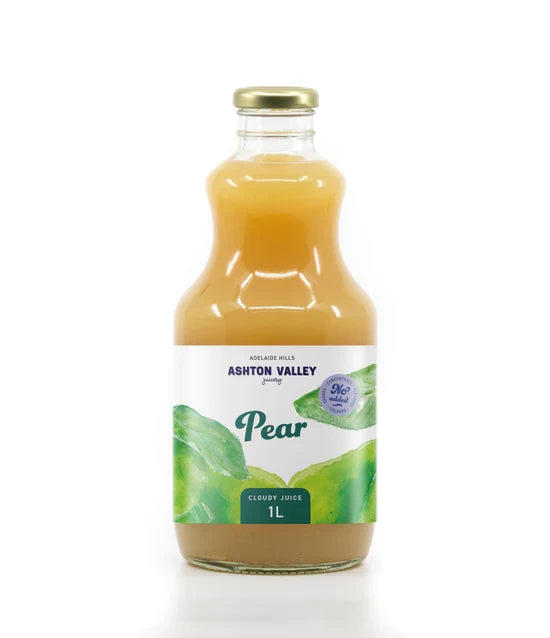 A 1L glass of Ashton Valley Juicery still cloudy pear juice