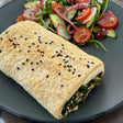 A serve of Continental Bakery Vegan Spinach & Cheese Roll