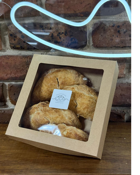 A box of 4 Crafers Bakehouse Vegetarian Pasty's