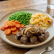 A 460g serve of Dinner King Braised Steak and Onions