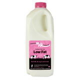 Fleuries Milk Company low fat milk bottle with pink cap on a white background