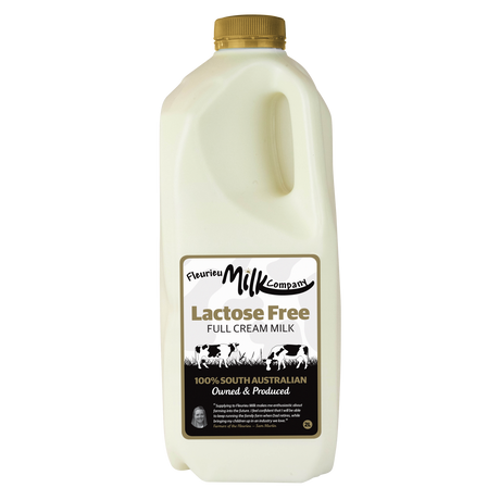 Lactose-free milk container with a gold lid on a white background