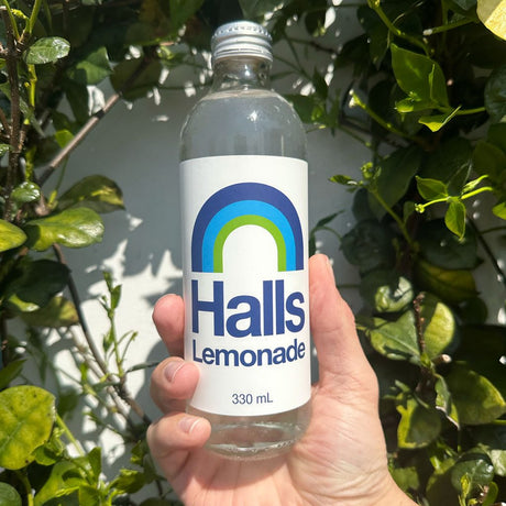 A 330ml glass bottle of Halls Lemonade