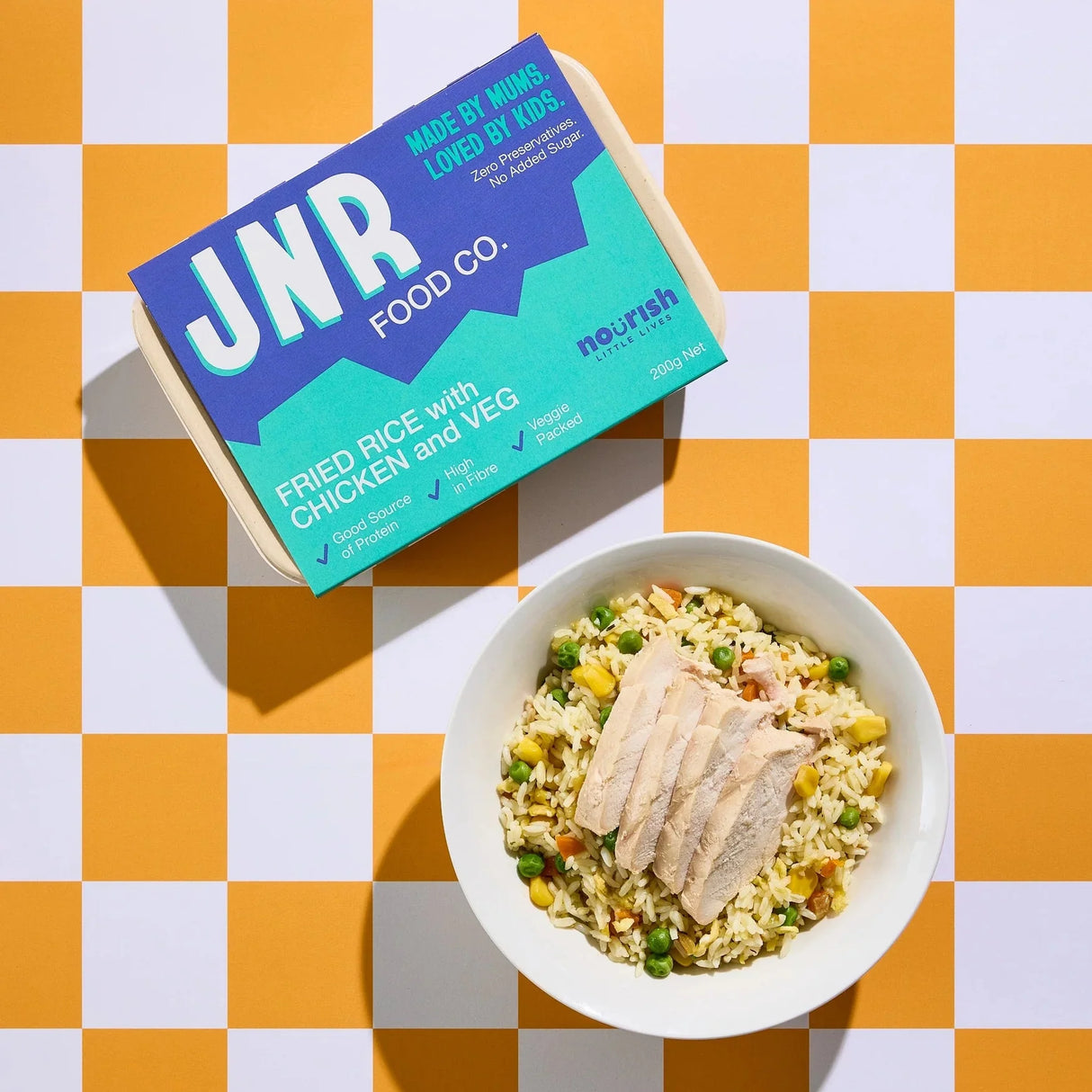 JNR Food Co. package with a bowl of fried rice on a checkered tablecloth