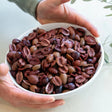 A 1kg serve of Kangaroo Island Olives Halved Kalamata Olives