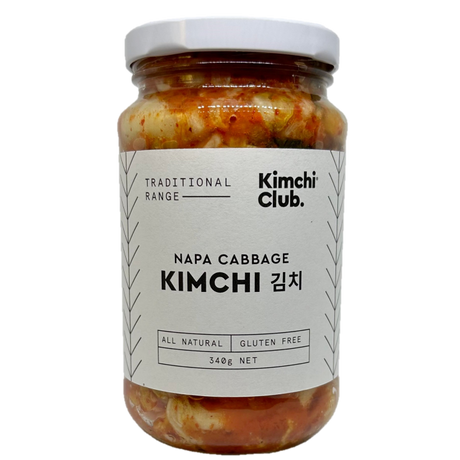 A 340g glass jar of Kimchi Club Traditional Napa Cabbage Kimchi 340