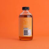 A 250ml glass bottle of Salt Gang Hot Fermented Honey