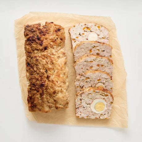 A 1kg serve of The Pet Butcher Baked Chicken Veggie and Egg Loaf