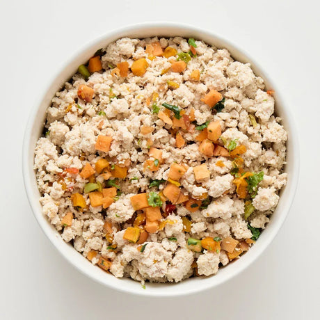 A 500g serve of The Pet Butcher Chicken and Seasonal Veggies Meal